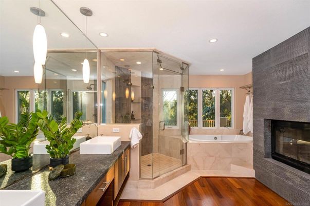 Bathroom, Fireplace, Glass Shower, Interior, Pendant Lights, Recessed Lighting, Wood Texture Flooring