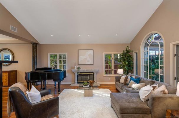 Fireplace, Interior, Living room, Piano, Recessed Lighting, Wood Texture Flooring