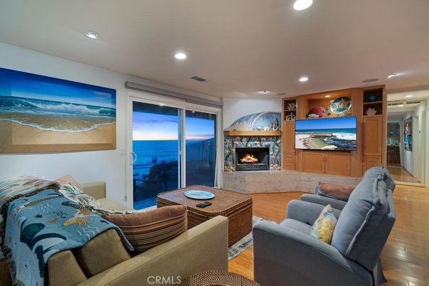 Fireplace, Interior, Living room, Recessed Lighting, Water, Wood Texture Flooring