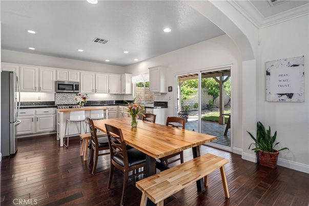 Dining room, Interior, Kitchen, Recessed Lighting, Stainless Steel Appliances, Wood Texture Flooring