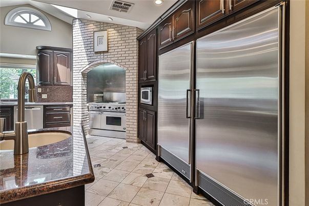 Interior, Kitchen, Recessed Lighting, Stainless Steel Appliances, Stone Walls