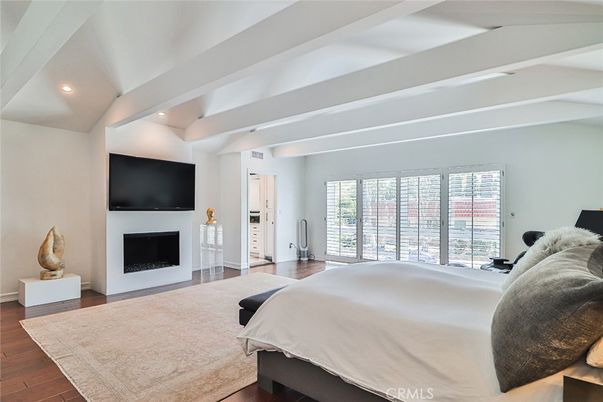 Bedroom, Fireplace, Interior, Recessed Lighting, Wood Texture Flooring