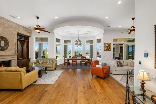 Chandelier, Dining room, Fireplace, Interior, Living room, Recessed Lighting, Stone Walls, Wood Texture Flooring