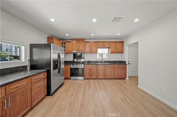 Interior, Kitchen, Recessed Lighting, Stainless Steel Appliances, Wood Texture Flooring