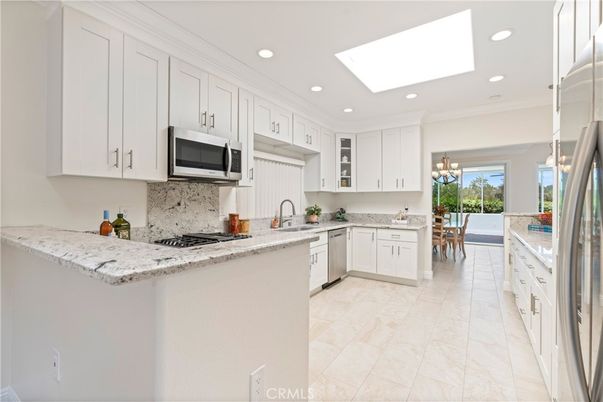 Chandelier, Dining room, Interior, Kitchen, Recessed Lighting, Stainless Steel Appliances