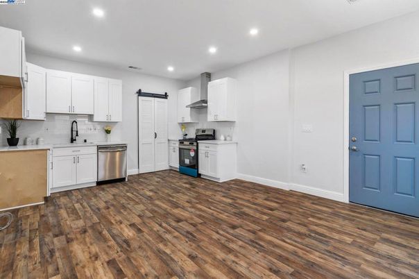 Interior, Kitchen, Recessed Lighting, Stainless Steel Appliances, Wood Texture Flooring