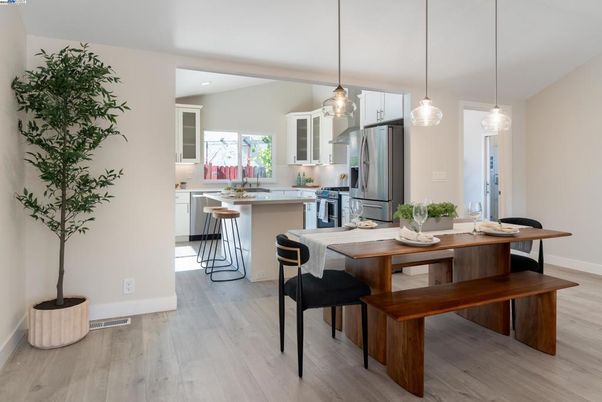 Dining room, Interior, Kitchen, Pendant Lights, Recessed Lighting, Stainless Steel Appliances, Wood Texture Flooring