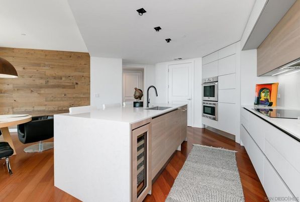 Interior, Kitchen, Recessed Lighting, Stainless Steel Appliances, Wood Texture Flooring, Wooden Walls