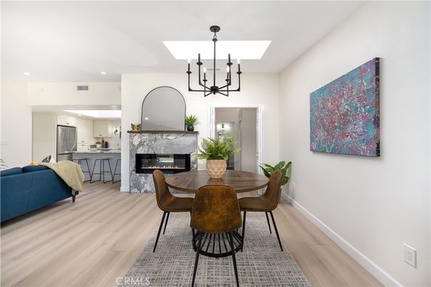 Chandelier, Dining room, Fireplace, Interior, Kitchen, Living room, Pendant Lights, Recessed Lighting, Wood Texture Flooring