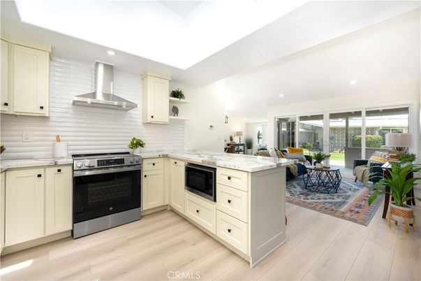 Dining room, Interior, Kitchen, Recessed Lighting, Stainless Steel Appliances, Wood Texture Flooring