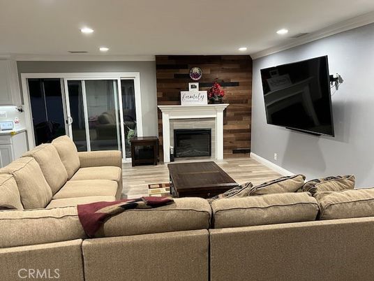 Fireplace, Interior, Living room, Recessed Lighting, Wood Texture Flooring, Wooden Walls