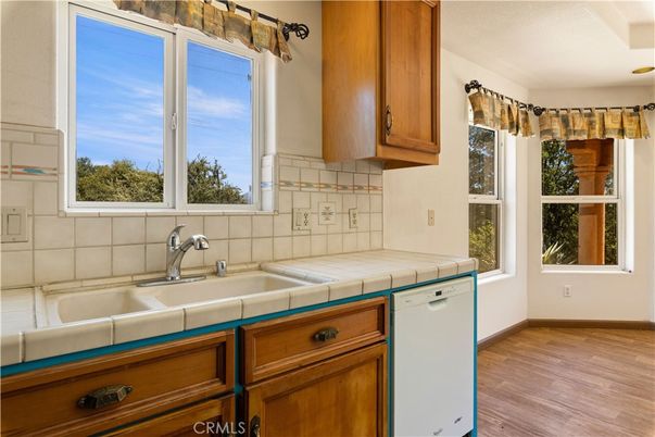 Interior, Kitchen, Tile Countertops, Wood Texture Flooring