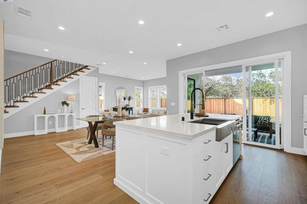 Dining room, Interior, Kitchen, Recessed Lighting, Stainless Steel Appliances, Wood Texture Flooring