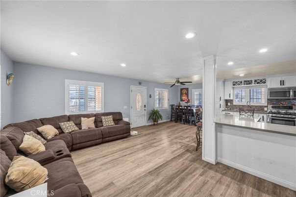 Dining room, Interior, Kitchen, Living room, Recessed Lighting, Stainless Steel Appliances, Wood Texture Flooring