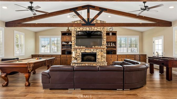 Billiard Table, Fireplace, Game Room, Interior, Living room, Recessed Lighting, Wooden Beams, Wood Texture Flooring