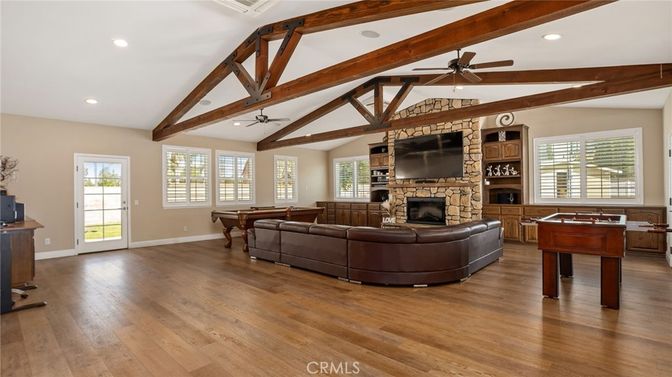 Billiard Table, Fireplace, Game Room, Interior, Living room, Recessed Lighting, Wooden Beams, Wood Texture Flooring