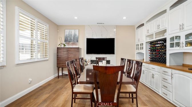 Dining room, Interior, Marble Walls, Recessed Lighting, Wine Storage, Wood Texture Flooring