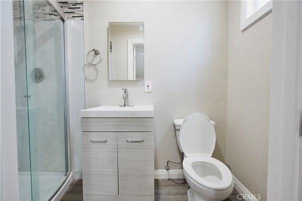 Bathroom, Glass Shower, Interior, Wood Texture Flooring