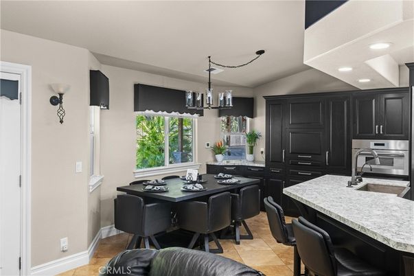 Chandelier, Dining room, Interior, Kitchen, Recessed Lighting, Stainless Steel Appliances