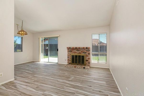 Empty room, Fireplace, Interior, Pendant Lights, Wood Texture Flooring