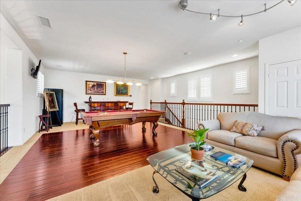 Billiard Table, Game Room, Interior, Living room, Pendant Lights, Recessed Lighting, Wood Texture Flooring