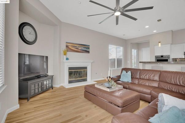 Fireplace, Interior, Kitchen, Living room, Recessed Lighting, Wood Texture Flooring