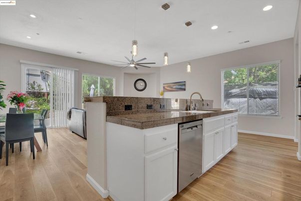 Dining room, Interior, Kitchen, Pendant Lights, Recessed Lighting, Tile Countertops, Wood Texture Flooring