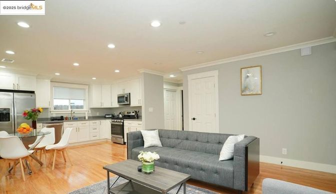 Dining room, Interior, Kitchen, Living room, Recessed Lighting, Stainless Steel Appliances, Wood Texture Flooring