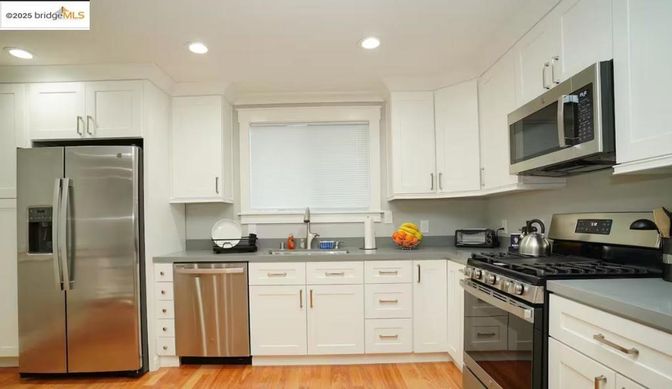 Interior, Kitchen, Recessed Lighting, Stainless Steel Appliances, Wood Texture Flooring