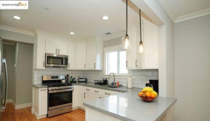 Interior, Kitchen, Pendant Lights, Recessed Lighting, Stainless Steel Appliances, Wood Texture Flooring