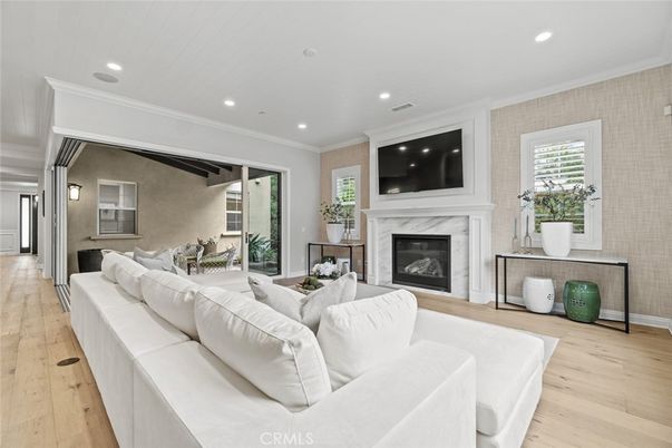 Dining room, Fireplace, Interior, Living room, Recessed Lighting, Wood Texture Flooring