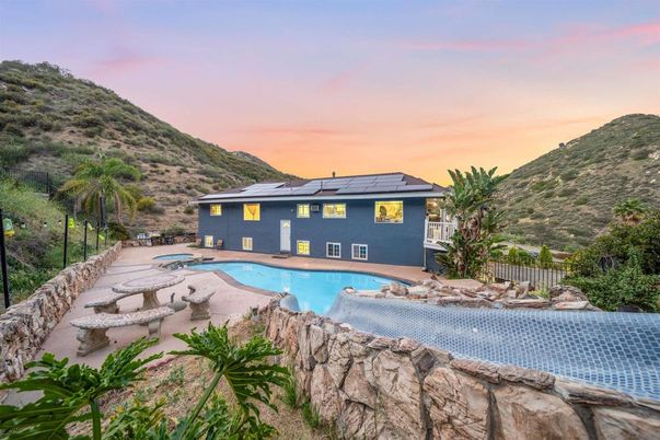 Exterior, Pool, Solar Panels