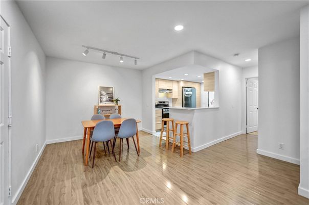 Dining room, Interior, Kitchen, Recessed Lighting, Stainless Steel Appliances, Wood Texture Flooring