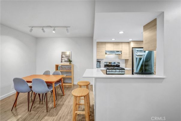 Dining room, Interior, Kitchen, Recessed Lighting, Stainless Steel Appliances, Wood Texture Flooring