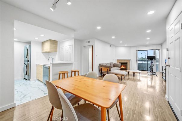 Dining room, Fireplace, Interior, Kitchen, Living room, Marble, Recessed Lighting, Wood Texture Flooring