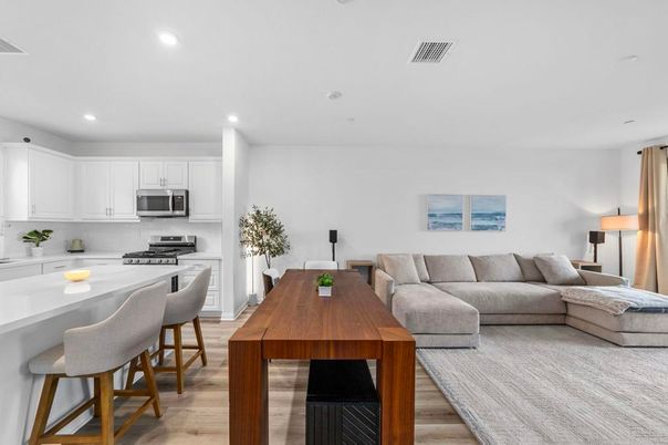 Dining room, Interior, Kitchen, Living room, Recessed Lighting, Stainless Steel Appliances, Wood Texture Flooring