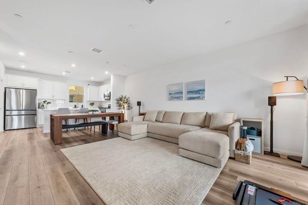 Dining room, Interior, Kitchen, Living room, Recessed Lighting, Stainless Steel Appliances, Wood Texture Flooring