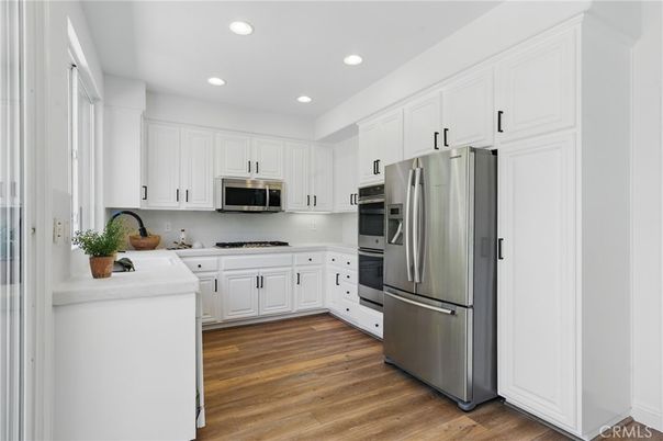 Interior, Kitchen, Recessed Lighting, Stainless Steel Appliances, Wood Texture Flooring