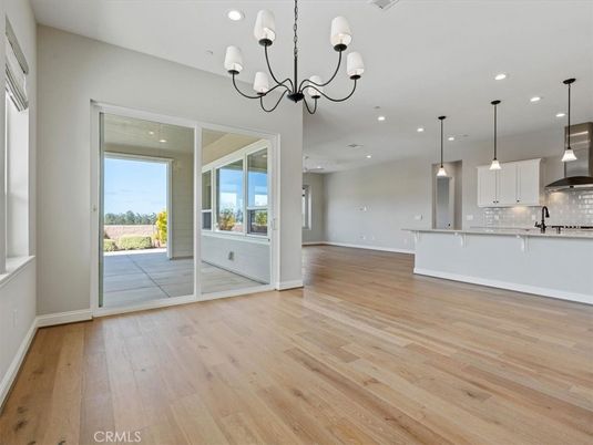 Chandelier, Empty room, Interior, Kitchen, Pendant Lights, Recessed Lighting, Wood Texture Flooring