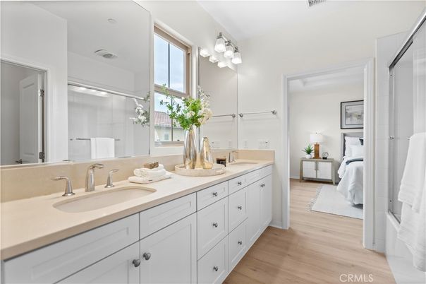 Bathroom, Bedroom, Dual Sink Vanities, Glass Shower, Interior, Wood Texture Flooring