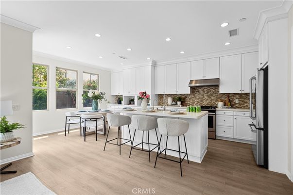 Dining room, Interior, Kitchen, Recessed Lighting, Stainless Steel Appliances, Wood Texture Flooring