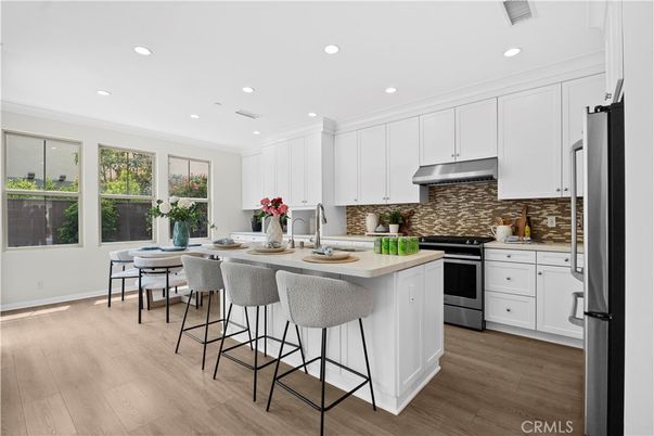 Dining room, Interior, Kitchen, Recessed Lighting, Stainless Steel Appliances, Wood Texture Flooring