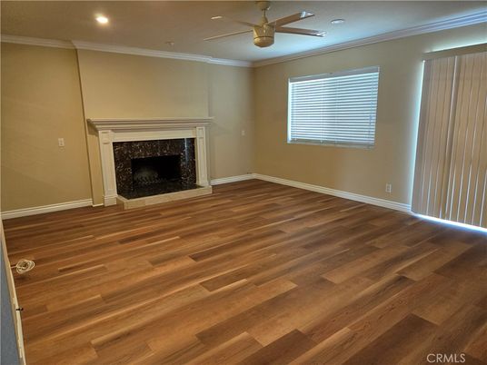 Empty room, Fireplace, Interior, Recessed Lighting, Wood Texture Flooring