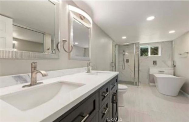 Bathroom, Dual Sink Vanities, Free Standing Baths, Glass Shower, Interior, Marble, Marble Walls, Recessed Lighting