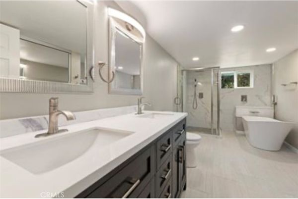 Bathroom, Dual Sink Vanities, Free Standing Baths, Glass Shower, Interior, Marble, Marble Walls, Recessed Lighting
