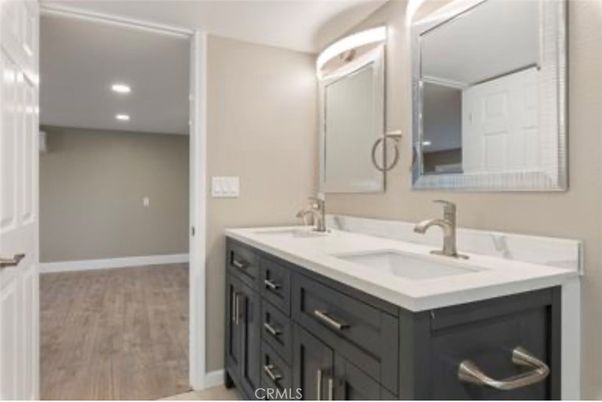 Bathroom, Dual Sink Vanities, Interior, Recessed Lighting, Wood Texture Flooring
