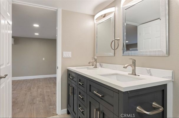 Bathroom, Dual Sink Vanities, Interior, Recessed Lighting, Wood Texture Flooring