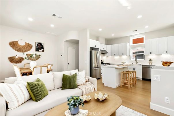 Dining room, Interior, Kitchen, Living room, Recessed Lighting, Stainless Steel Appliances, Wood Texture Flooring