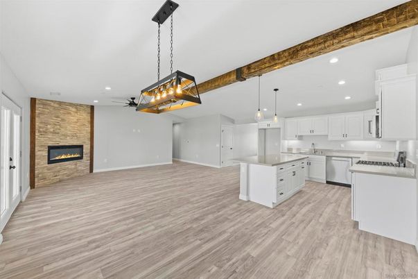 Fireplace, Interior, Kitchen, Pendant Lights, Recessed Lighting, Stone Walls, Wood Texture Flooring