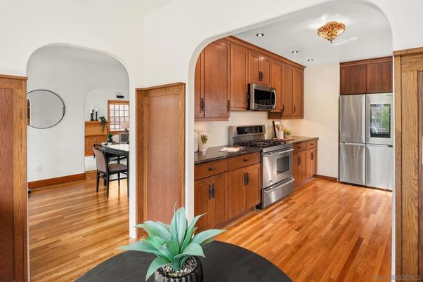 Dining room, Interior, Kitchen, Recessed Lighting, Stainless Steel Appliances, Wood Texture Flooring